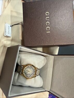 Gucci Gold-Tone Watch with Beige Monogram Strap and Dial